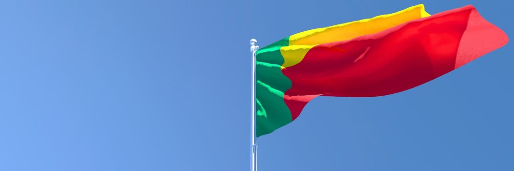 3D rendering of the national flag of Benin waving in the wind against a blue sky