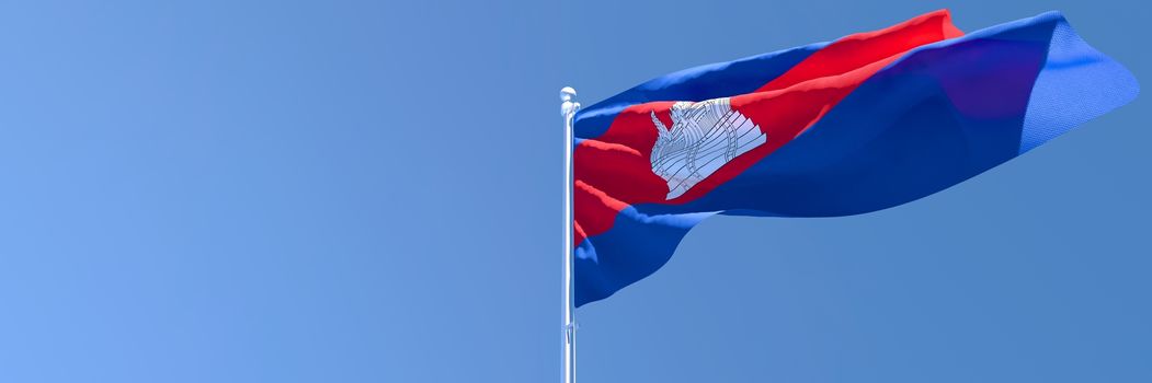 3D rendering of the national flag of Cambodia waving in the wind against a blue sky