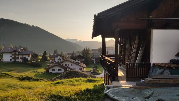 Val Gardena, Italy - 09/15/2020: Scenic alpine place with magical Dolomites mountains in background, amazing clouds and blue sky in Trentino Alto Adige region, Italy, Europe