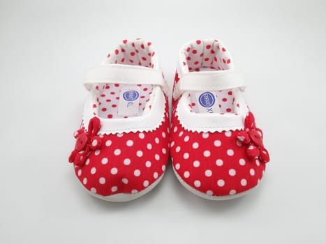 MANILA, PH - SEPT 24 - Enfant red polka dots baby shoes on September 24, 2020 in Manila, Philippines.