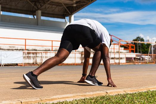 Asian young athlete sport runner black man active ready to start running training at the outdoor on the treadmill for a step forward, healthy exercise workout, closeup back on feet shoe