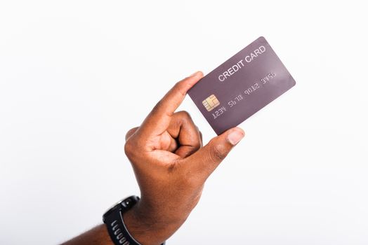 Closeup hand black man holding bank mockup money credit card on hand for payment transfer, studio shot isolated on white background