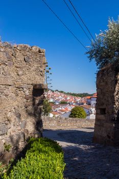 Castelo de Vide, with rooftops and landscape. Santa Maria Church and Dom Pedro seen from Castle Tower. Castelo de Vide, Alentejo, Portugal