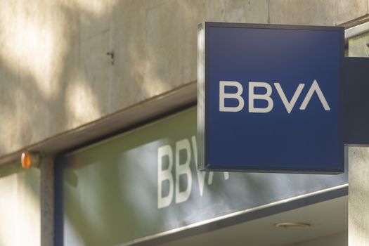 Madrid, Spain - May 18, 2020: Main facade at the entrance to the bank office of, BBVA, in the Retiro district.