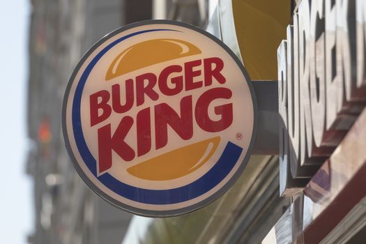 Madrid, Spain - May 18, 2020: Main access area to the fast food and hamburger restaurant, Burger King, in the Retiro district, Ibiza street.