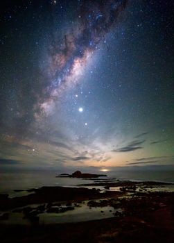Milky way over the coast  of Eden Australia as dawn approaches