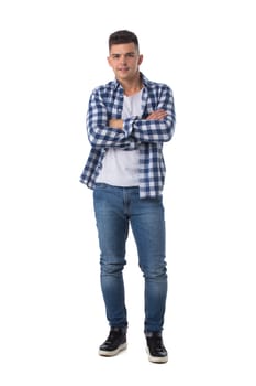 Full length portrait of happy handsome young man with folded arms isolated on white background, casual people