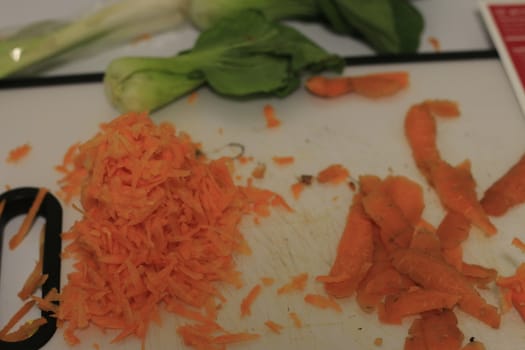 peeling and shredding carrots. High quality photo