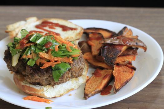 Japanese umami burger and sweet potato fries. High quality photo