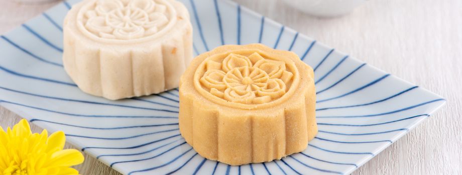 Colorful beautiful moon cake, mung bean cake, Champion Scholar Pastry cake for Mid-Autumn festival traditional gourmet dessert snack, close up.