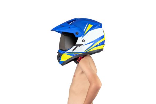 A boy wearing a motocross helmet standing but without a shirt isolated on white background.