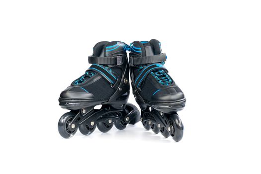 Pair of children's new inline skates isolated on white background.