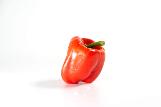 large fresh paprika red color isolated on white background.