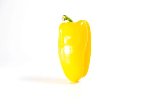 large fresh paprika yellow color isolated on white background.