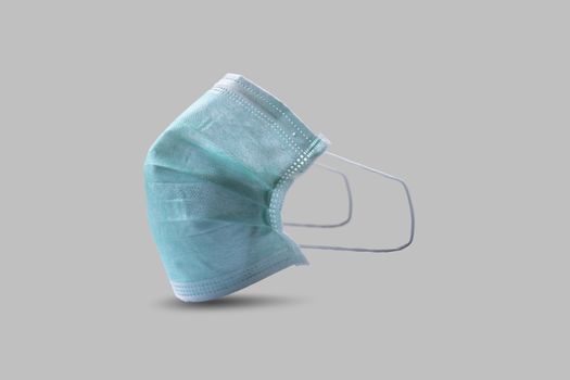 Sanitary napkin mask for preventing spreading and respiratory infections isolated on gray background, Stop Coronavirus Covid-19 concept.