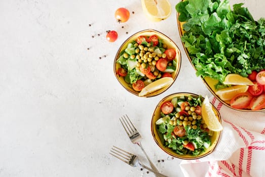 Healthy Food concept. Fresh vegetable salad in the bowl top view flat lay