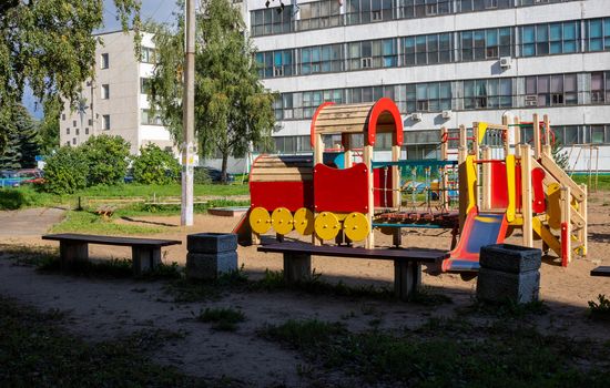 Empty beautiful modern Playground with steam train in the Park children's concept of outdoor activities.