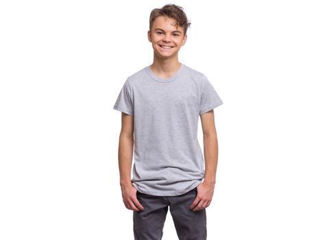 T-shirt design concept. Teen boy in blank gray t-shirt, isolated on white background.