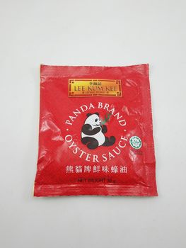 MANILA, PH - SEPT 24 - Lee kum kee panda brand oyster sauce sachet on September 24, 2020 in Manila, Philippines.