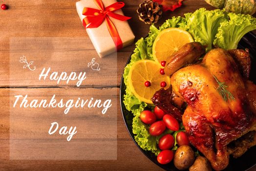 Thanksgiving baked turkey or chicken and vegetables, Christmas dinner feast food decoration, studio shot on wooden table background, Happy thanksgiving day of holiday concept