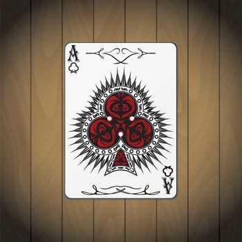 Ace of clubs poker card wood background.