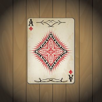 Ace of diamonds, poker cards old look varnished wood background.