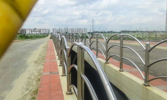 steel bridge closeup on river with sky