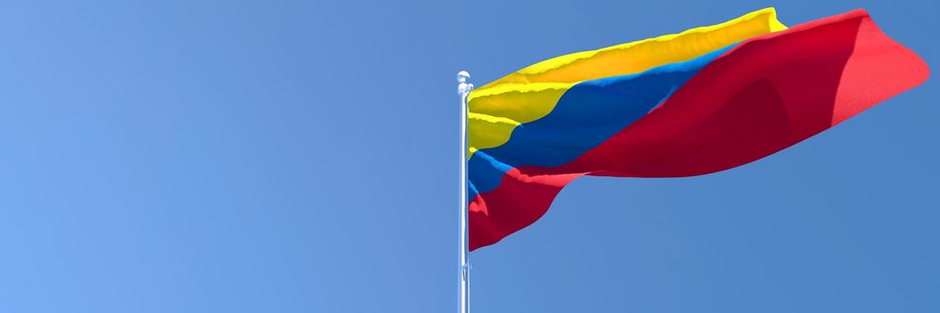 3D rendering of the national flag of Colombia waving in the wind against a blue sky