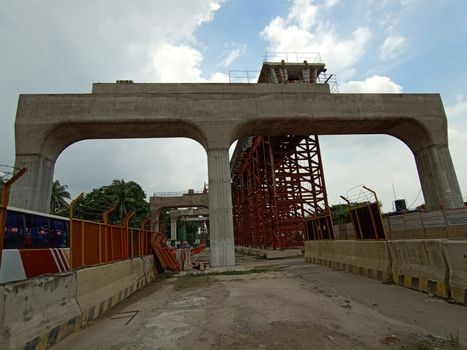 under construction flyover bridge on city with sky