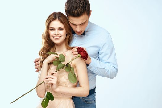man giving woman roses relationship charm lifestyle embrace lifestyle. High quality photo