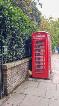 Classic red British telephone booth in central London