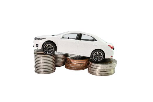 Coins stack with car, concept Saving money for car or trade car for cash