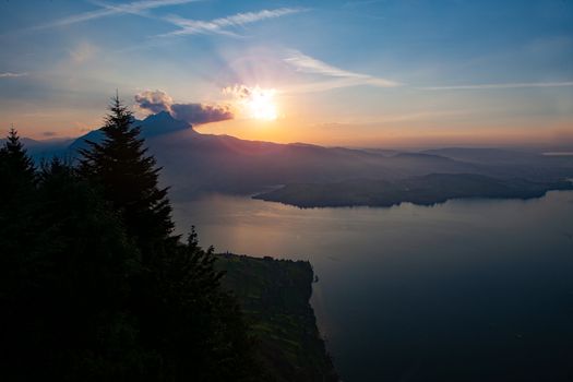 Sunaet with clouds with mount Pilatus