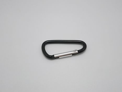 Black clip put on pants waist accessory use to hold multiple keys