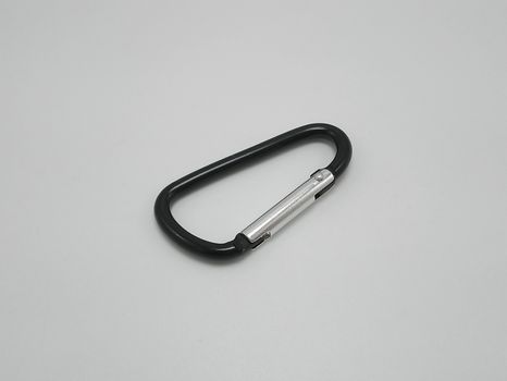 Black clip put on pants waist accessory use to hold multiple keys