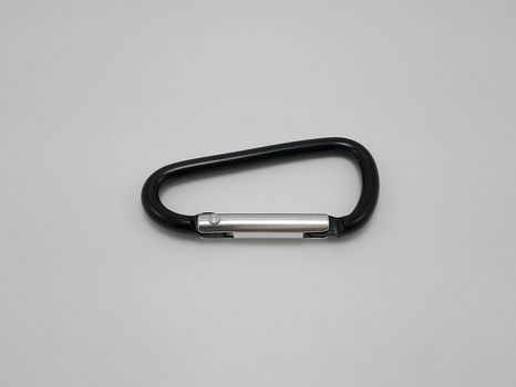 Black clip put on pants waist accessory use to hold multiple keys