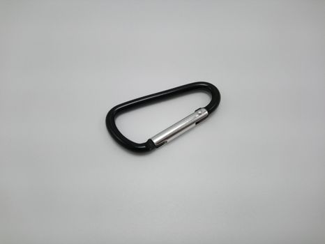 Black clip put on pants waist accessory use to hold multiple keys