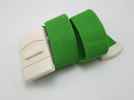 Green adjustable and stretchable fabric belt use to fasten things