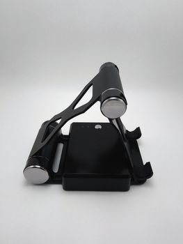 Foldable inclined stand powerbank charger use to charge low to empty battery of smartphone