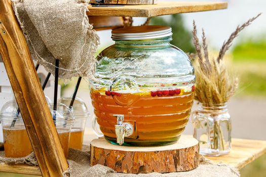 Jugs of lemonade at the summer outdoor party