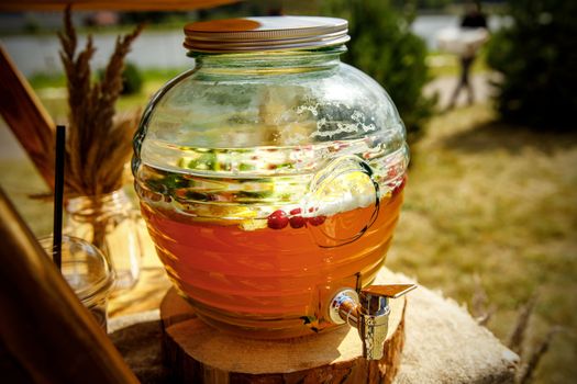 Jugs of lemonade at the summer outdoor party