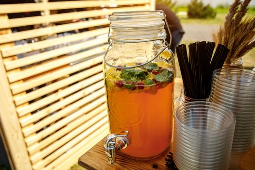 Jugs of lemonade at the summer outdoor party