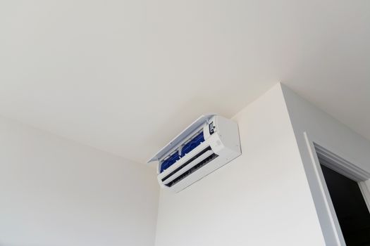 Wall mounted air conditioner, used for home or office.