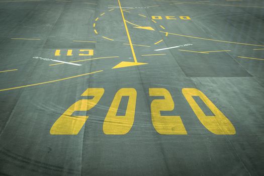The 2020 number sign on the airport runway shows the coming New Year's reception soon.