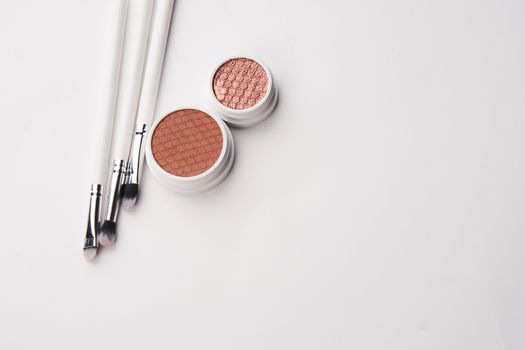 professional eyeshadow on isolated background and makeup brushes cosmetics fashion. High quality photo