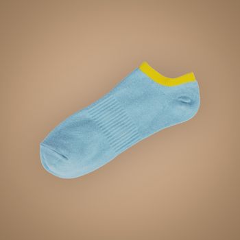 Gray short sport sock isolated on beautiful pastel color background, with clipping path.