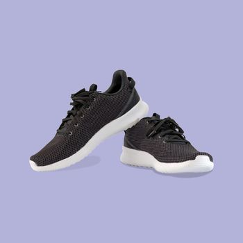 Fashion running sneaker shoes isolated on beautiful pastel color background, with clipping path.