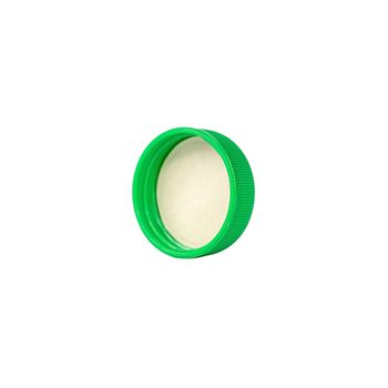 Green plastic bottle cap isolated on white background.