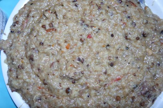 A close up view of Cooked white rice called Kichra served with green mint with traditional Charsadda recipe popular for its delicious taste in Pakistan