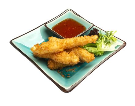 Tempura shrimp with chilli sauce. Isolated on white background. On a blue plate.